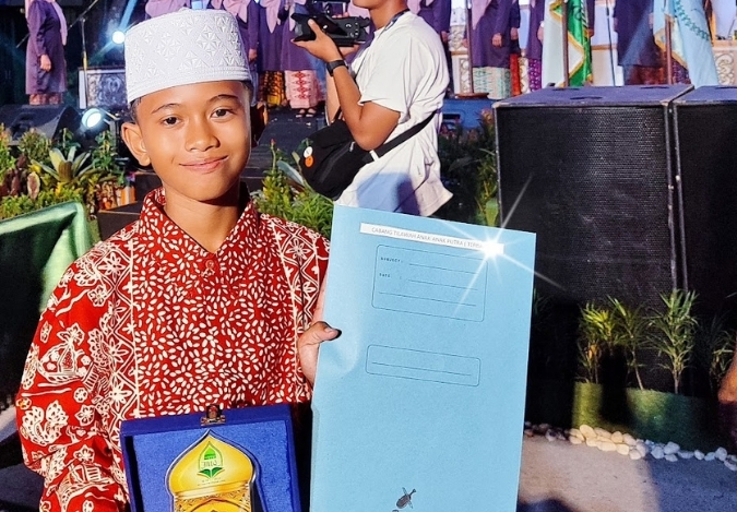 M. Fawwaz Adz Dzikra Ukir Prestasi Tilawah Anak di MTQ Kec. Pasar Jambi