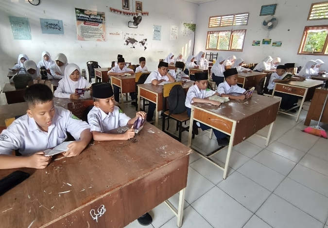 Pembiasaan Baca Al-Qurâ€™an Setiap Pagi: Menyemai Cahaya di MTsN 2 Kota Jambi