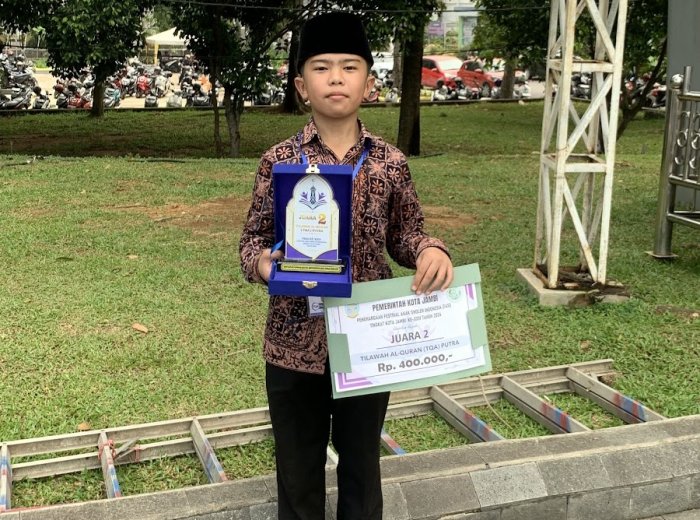 Lewat Seni Tilawah, Muhammad Haikal Raih Juara di Ajang BKPRMI Kota Jambi