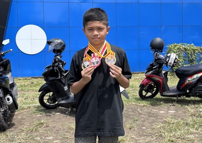 Arkana Zidane Sihite Raih Juara di Tiga Nomor Renang Berbeda
