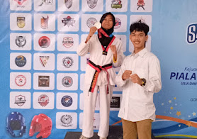 Fokus di Arena, Faathimatul Izzatil Fawziyyah Sabet Juara 2 Taekwondo