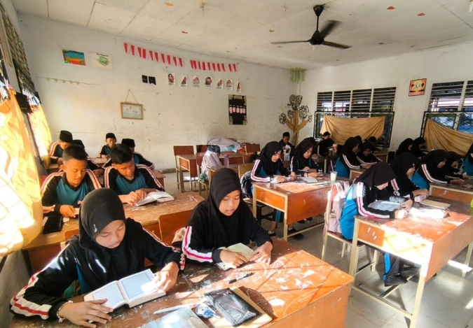 Kelas 8E Menyambut Hari dengan Lantunan Ayat Suci