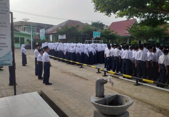 OSIM MTsN 2 Kota Jambi Ikut Berperan Aktif Menjaga Ketertiban Upacara Bendera OSIM MTsN 2 Kota Jambi Ikut Berperan Aktif Menjaga Ketertiban Upacara Bendera